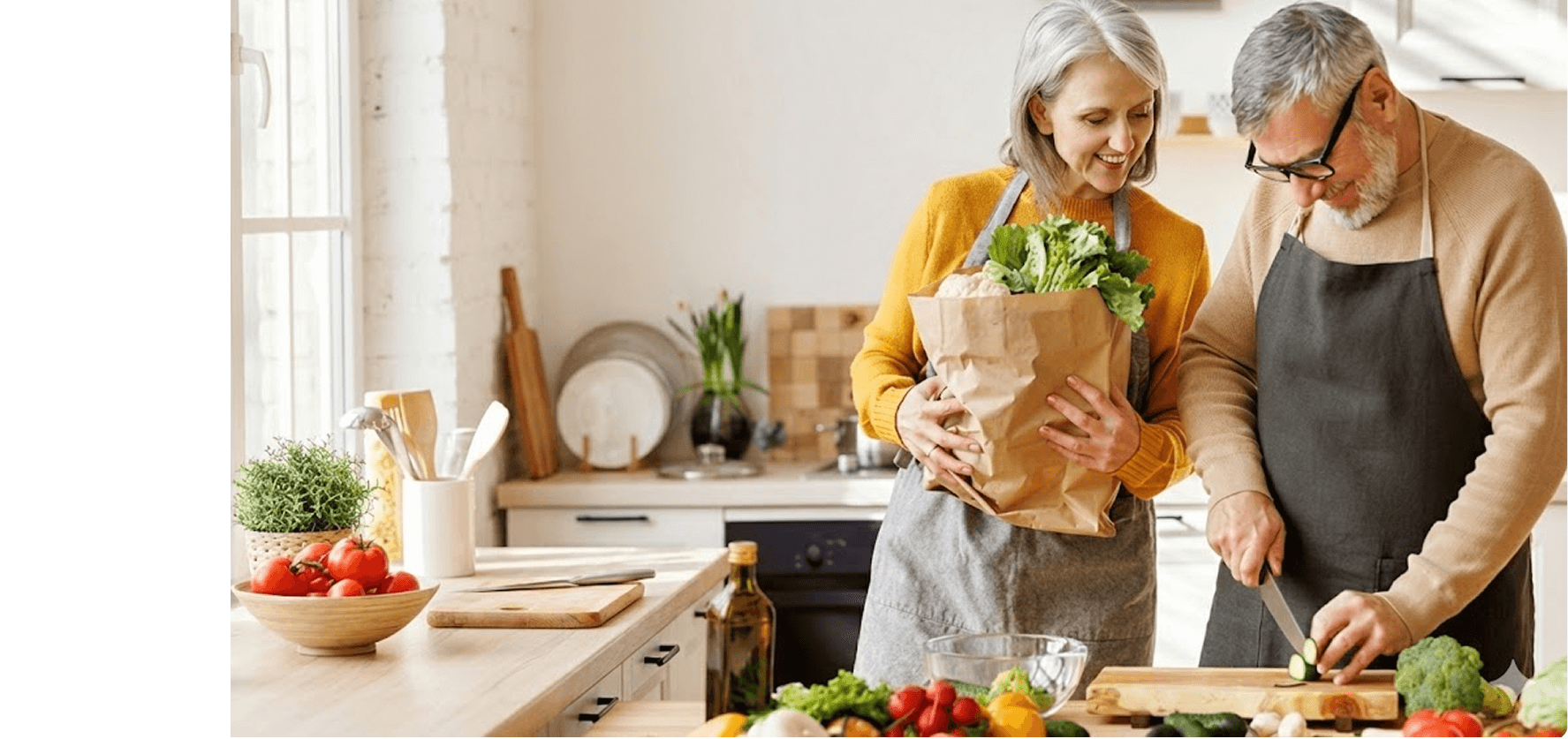 Couple preparing healthy food in kitchen